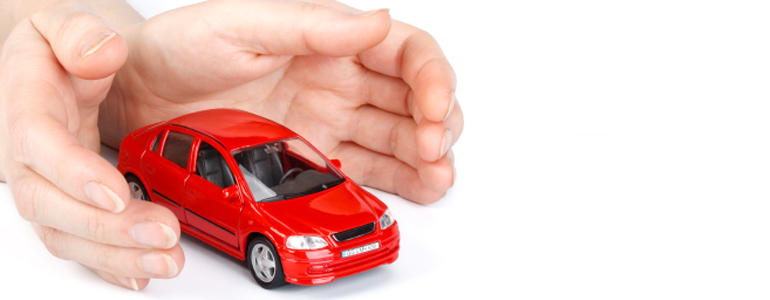 Image of small red car with hands around it 